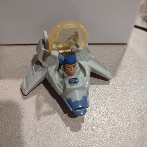 Lot features two Disney Pixar moving vehicles from the popular Toy Story Buzz - Picture 9 of 9